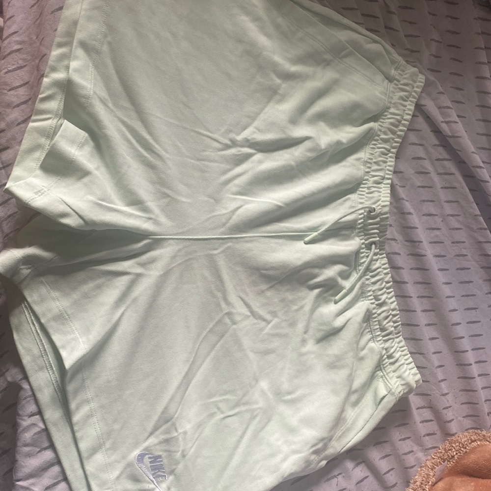 nike teal sports shorts.